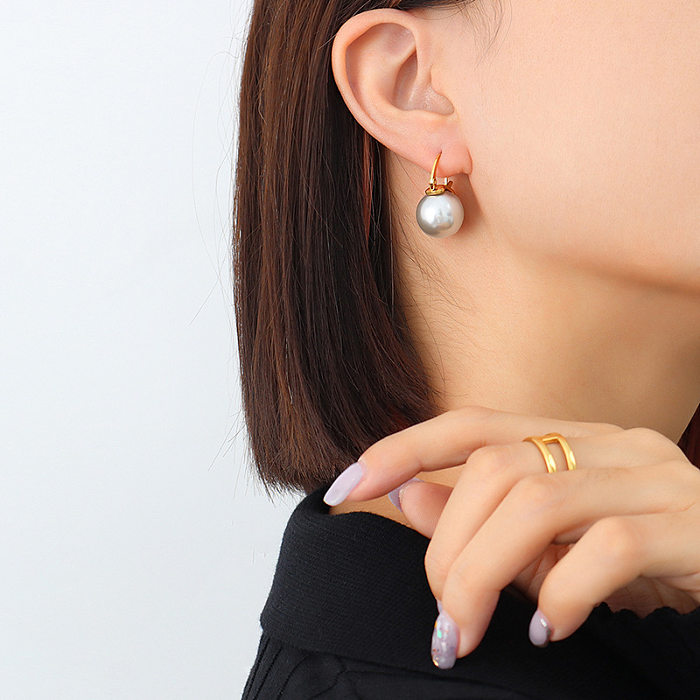 Joyería de oreja de acero inoxidable con perlas geométricas simples
