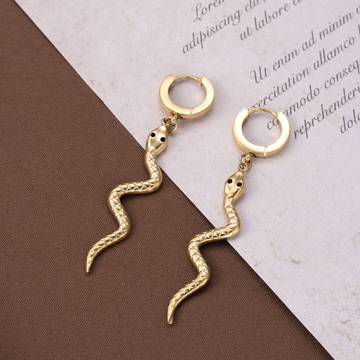 1 par de pendientes de cadena con borlas de acero inoxidable con forma de serpiente y ojo cruzado de estilo moderno