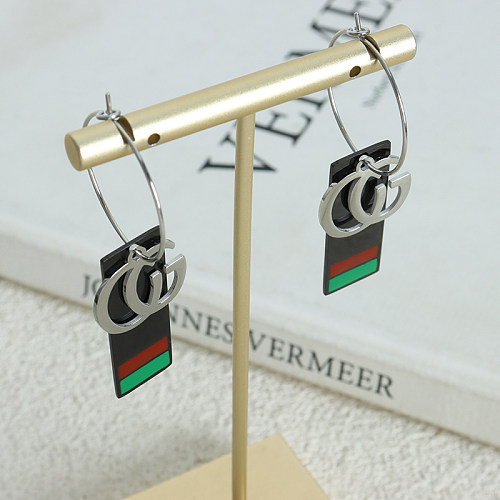 1 Paar moderne Ohrringe im britischen Stil mit runder Beschichtung aus Edelstahl mit 18-Karat-Vergoldung
