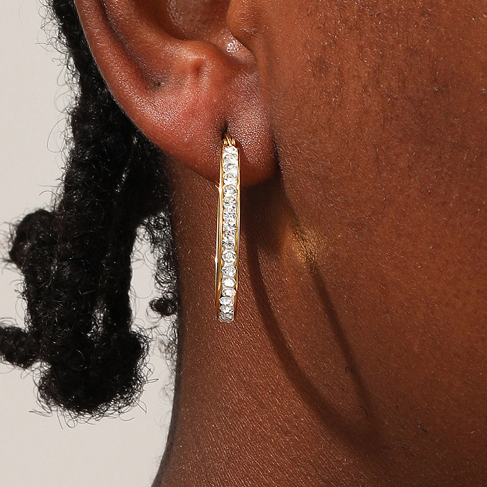 1 paire de boucles d'oreilles rondes en acier inoxydable avec incrustation de strass