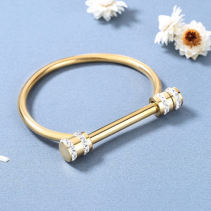Brazalete chapado en oro de 18 quilates con incrustaciones de diamantes de imitación de acero de titanio de Color sólido de estilo Simple lujoso elegante