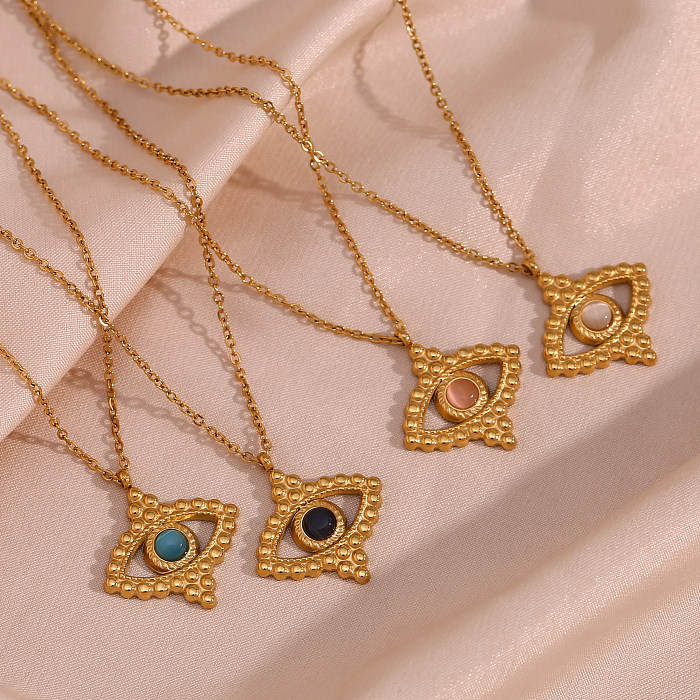 Collier pendentif plaqué or 18 carats avec incrustation de placage en acier inoxydable pour les yeux de style vintage