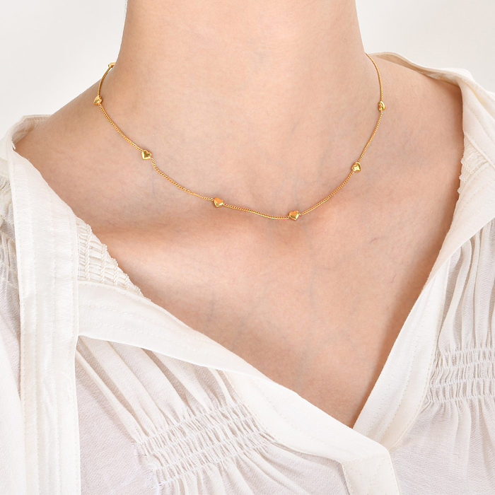 Lässige, schlichte Halskette in Herzform aus Edelstahl mit Edelstahlbeschichtung und vergoldet