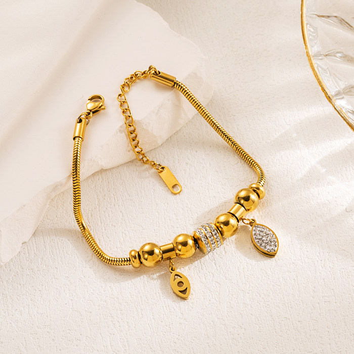 Bracelets plaqués or avec incrustation de strass et d'émail en acier et titane œil du diable de Style moderne