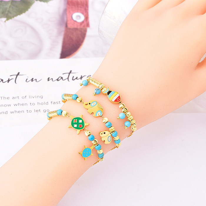 Bracelets plaqués or 18 carats turquoise avec incrustation d'acier titane animal de style simple et mignon