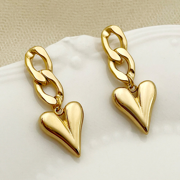 1 par de brincos em forma de coração estilo IG banhados a ouro em aço inoxidável