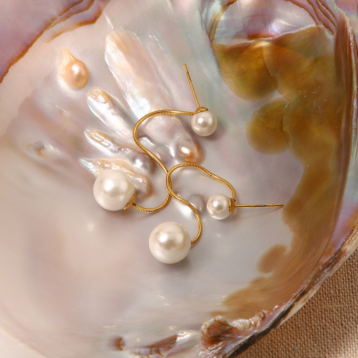 Elegante runde Ohrringe mit Perleneinlage aus Edelstahl, 1 Paar