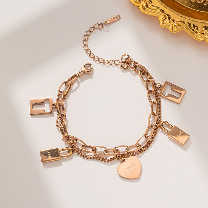 Bracelets décontractés en acier titane avec serrure en forme de cœur
