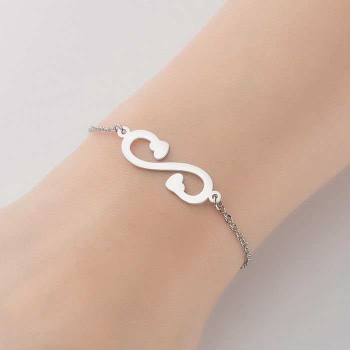 1 pièce de bracelets en acier titane en forme d'étoile et de cœur à la mode