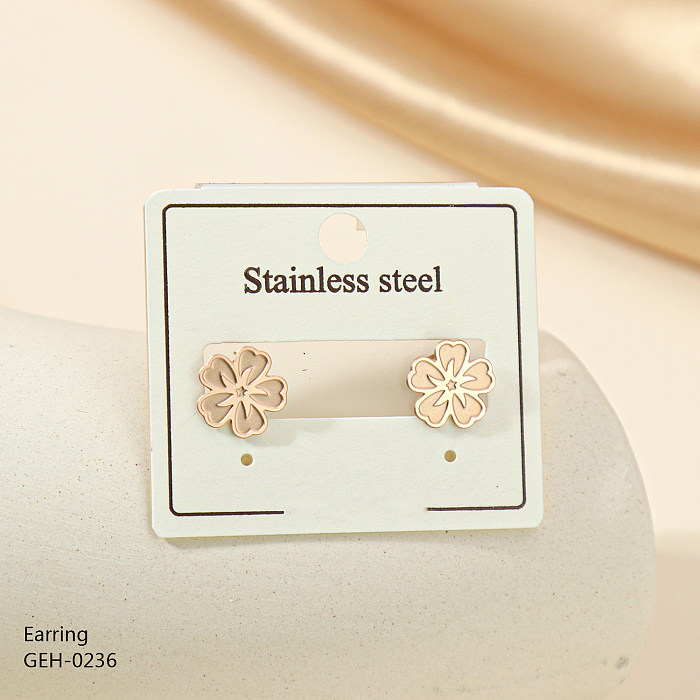 1 par estilo simples trevo de quatro folhas flor incrustação strass de aço inoxidável banhado a ouro rosa brincos de orelha banhados a prata