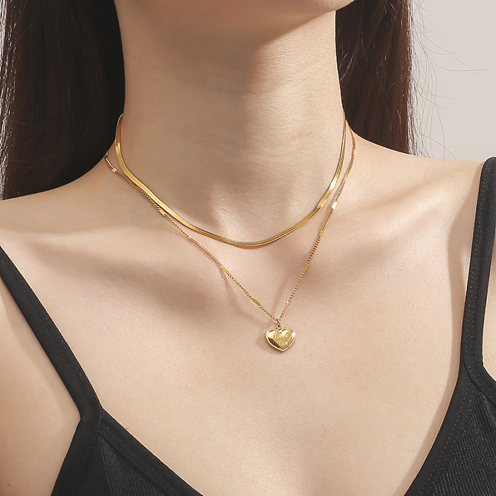Collar plateado oro pulido elegante del chapado en oro 18K del acero inoxidable de la forma del corazón
