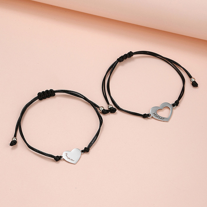 Bracelets à cordon en acier titane avec lettre de style simple, vente en gros