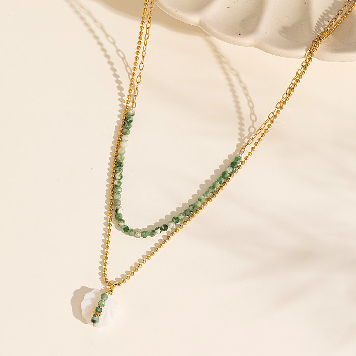 Elegante, mehrschichtige Halsketten mit Farbblock-Edelstahllegierung und Muschelperlenbeschichtung, vergoldet