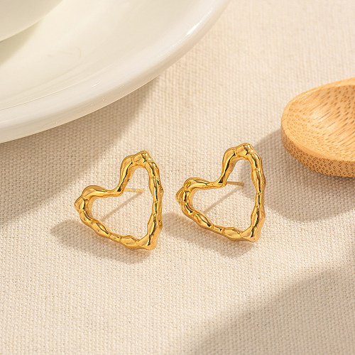 1 par de pendientes con forma de corazón de acero inoxidable chapado en oro de 18 quilates
