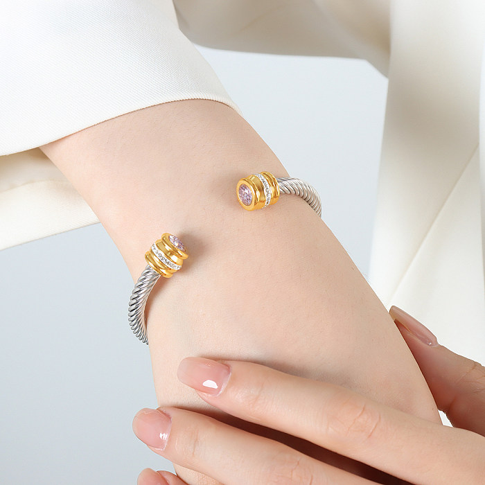 Bracelet plaqué or 18 carats avec incrustation de placage en acier titane rond brillant de style simple