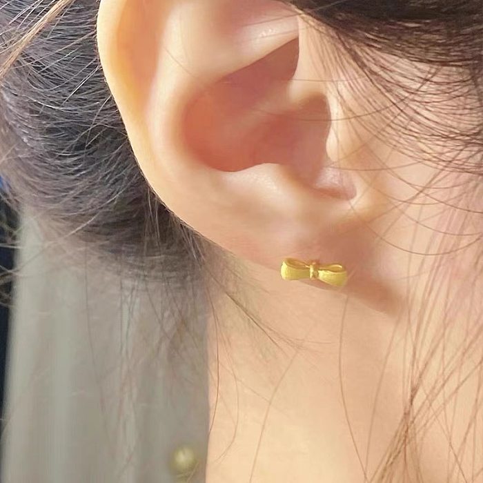 1 paire de clous d'oreilles plaqués or 18 carats, Style Simple, nœud papillon plaqué en acier inoxydable