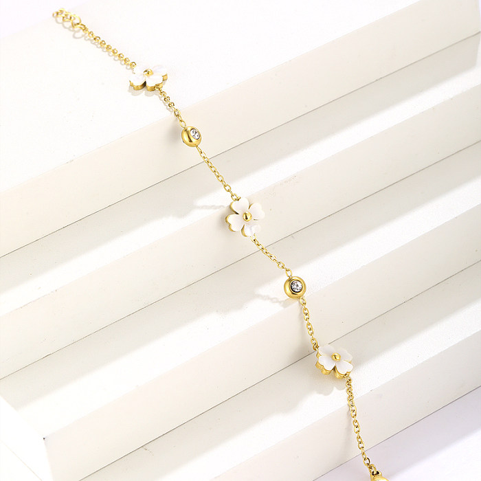 Pulseras chapadas en oro de 18K con diamantes artificiales con incrustaciones de acero inoxidable con flores elegantes de Streetwear