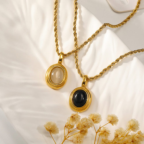 Collier pendentif en agate incrusté d'acier inoxydable ovale de style simple rétro