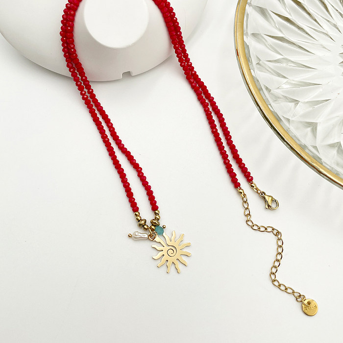 Chinoiserie rétro soleil en acier inoxydable cristal artificiel perlé plaqué or pendentif collier