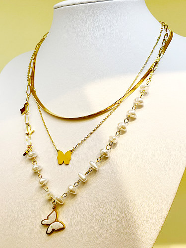 Glamouröse Streetwear-Schmetterlings-Halsketten aus Edelstahl mit Perlenbeschichtung und vergoldeten Lagen
