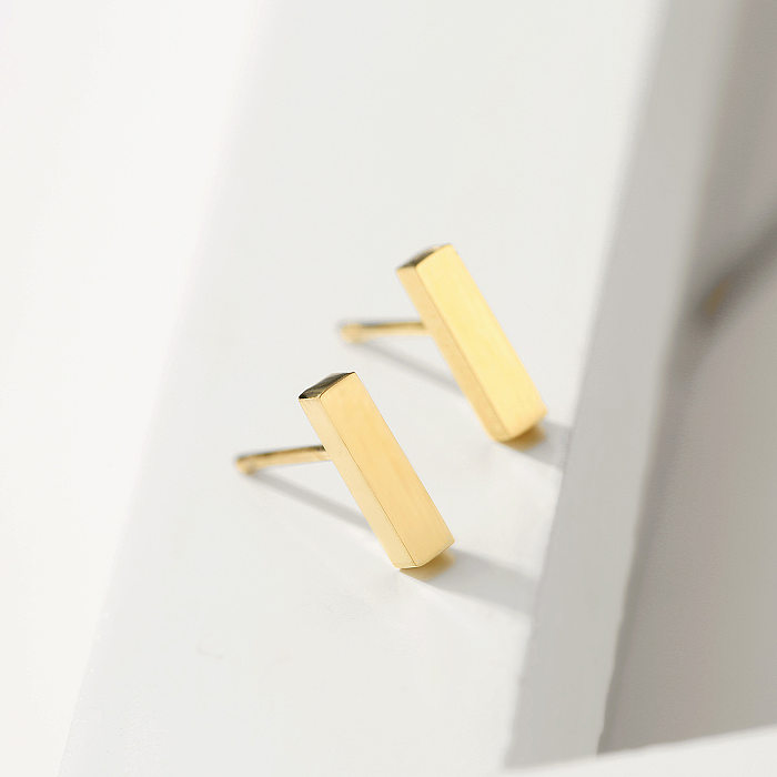 A orelha de aço inoxidável geométrica do estilo simples enche brincos de aço inoxidável chapeados ouro