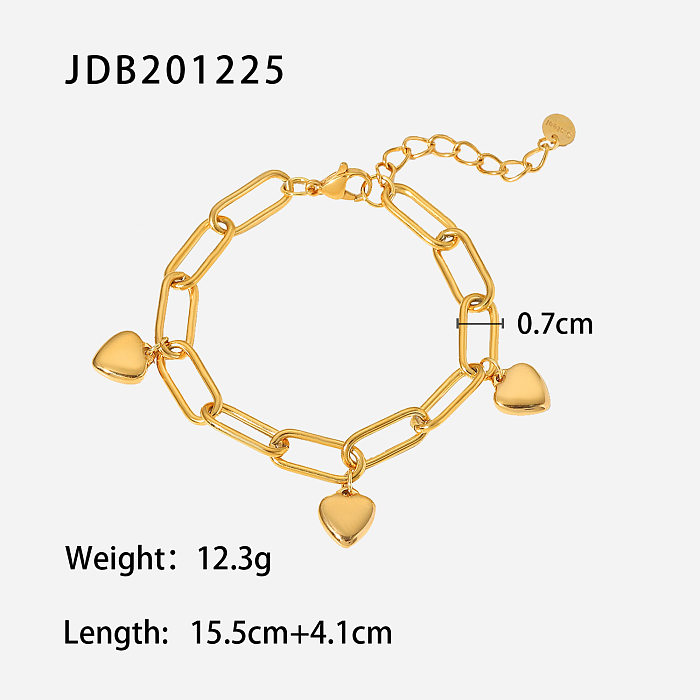 Bracelet à chaîne croisée avec pendentif à trois cœurs plaqué or 18 carats en acier inoxydable de style rétro