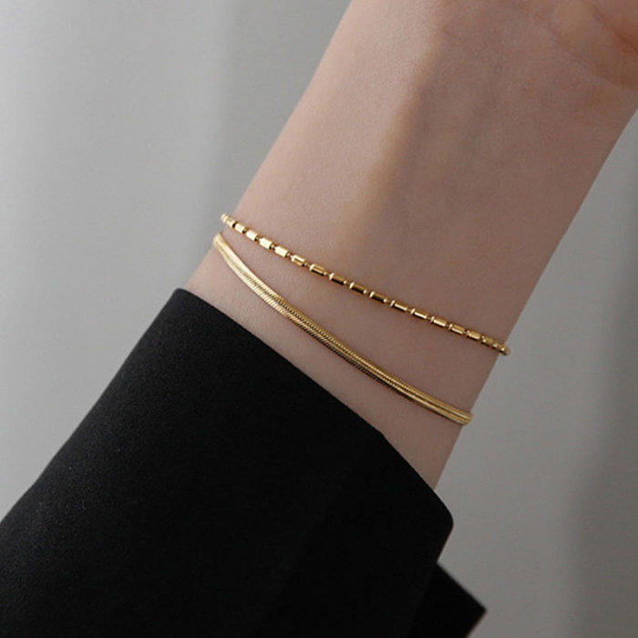 Pulseiras banhadas a ouro 18K de aço titânio de cor sólida estilo simples