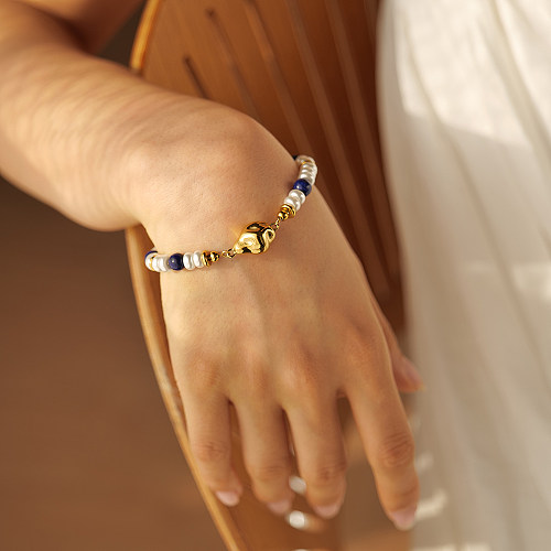 Schlichte runde Armbänder aus Edelstahl mit Perlen und 18 Karat vergoldetem Titanstahl
