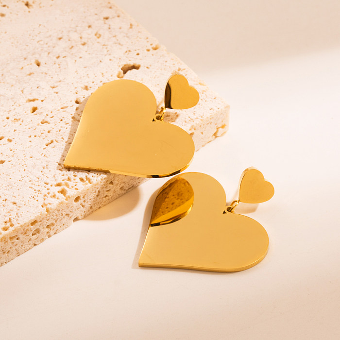 Pendientes chapados en oro de 1 quilates, aretes elegantes de acero inoxidable irregulares con forma de corazón y borlas exageradas, 18 par