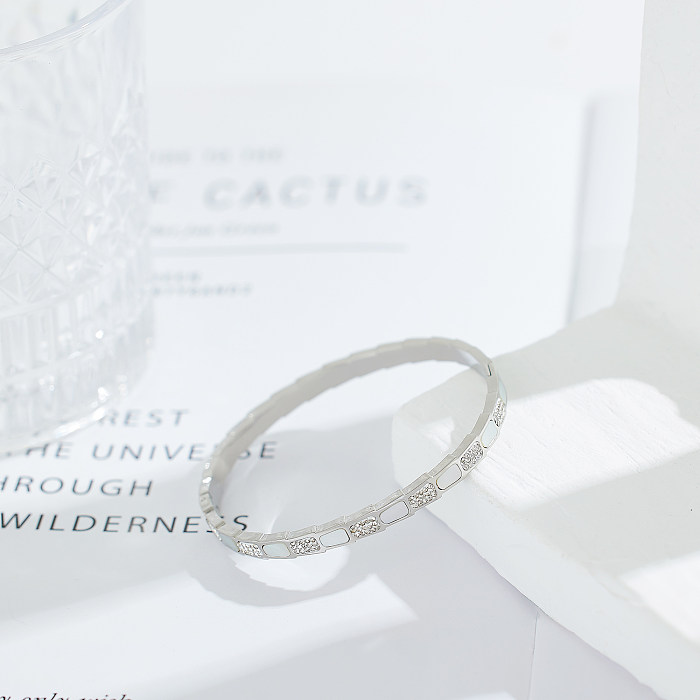 Bracelet en zircon avec incrustation de placage en acier inoxydable de couleur unie de style classique