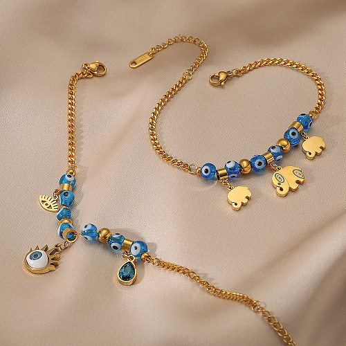 Bracelets plaqués or 18 carats en acier titane avec œil du diable pour trajet de style vintage
