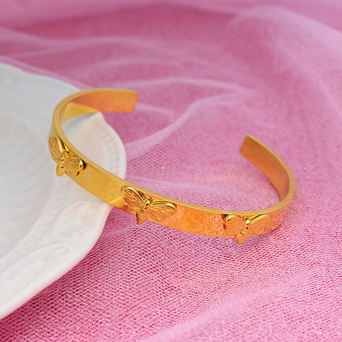 Pulseiras de punho banhadas a ouro 18K com chapeamento de aço inoxidável de libélula de estilo simples