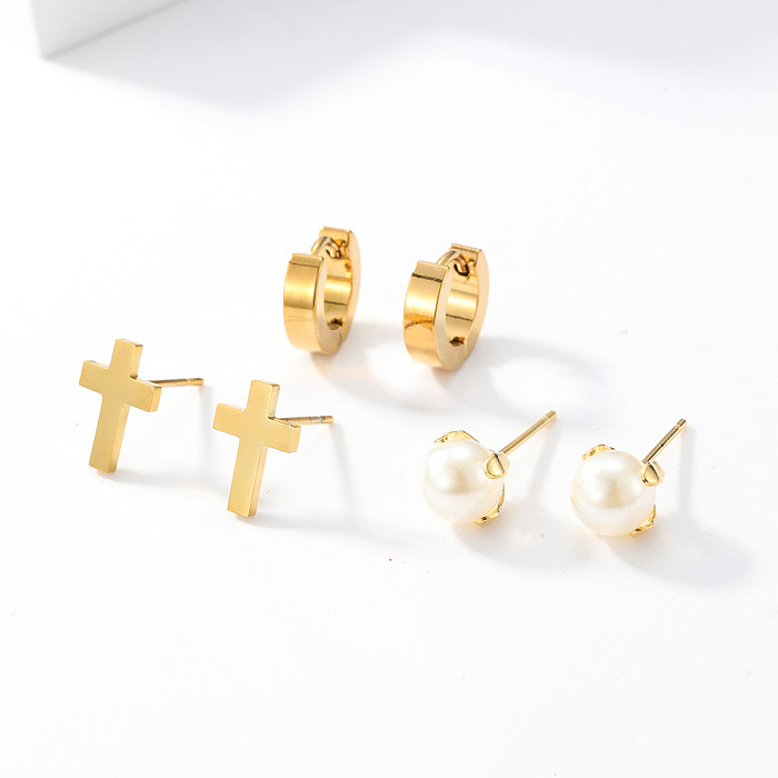 3 pares de pendientes de circonio con incrustaciones de perlas y mariposas en forma de corazón cruzado de estilo Simple a la moda
