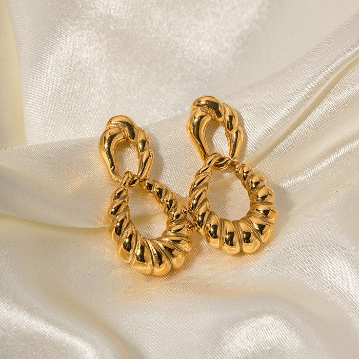 1 paire de boucles d'oreilles pendantes en acier inoxydable plaqué or 18 carats avec rayures en spirale