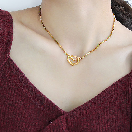 Collier pendentif en acier inoxydable en forme de coeur pour femme