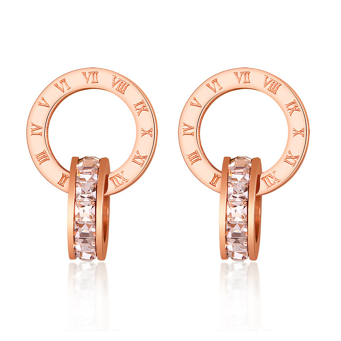 1 par de pendientes colgantes chapados en oro rosa con incrustaciones de números de estilo simple y diamantes de imitación de acero inoxidable