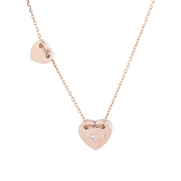 Mode européenne et américaine Cool en forme de coeur en acier inoxydable collier pendentif Simple amour lettre anglaise unique diamant clavicule chaîne femme