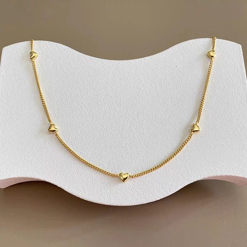 Niche tridimensionnelle marque de coeur de pêche collier d'amour Multiple collier de mode en acier inoxydable plaqué or chaîne de clavicule ventes directes d'usine