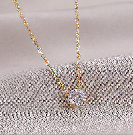 Collar con colgante chapado en oro con diamantes de imitación y incrustaciones de acero inoxidable redondo a la moda