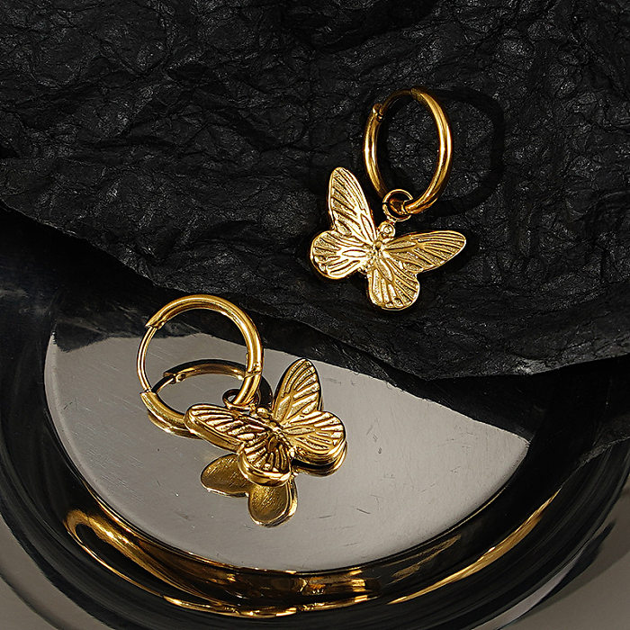Boucles d'oreilles pendantes en acier inoxydable, papillon à la mode, vente en gros