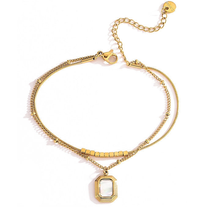 Schlichter Pendel-Armband mit geometrischer Titan-Stahlbeschichtung, Muschel-Intarsien und 18-Karat-Vergoldung