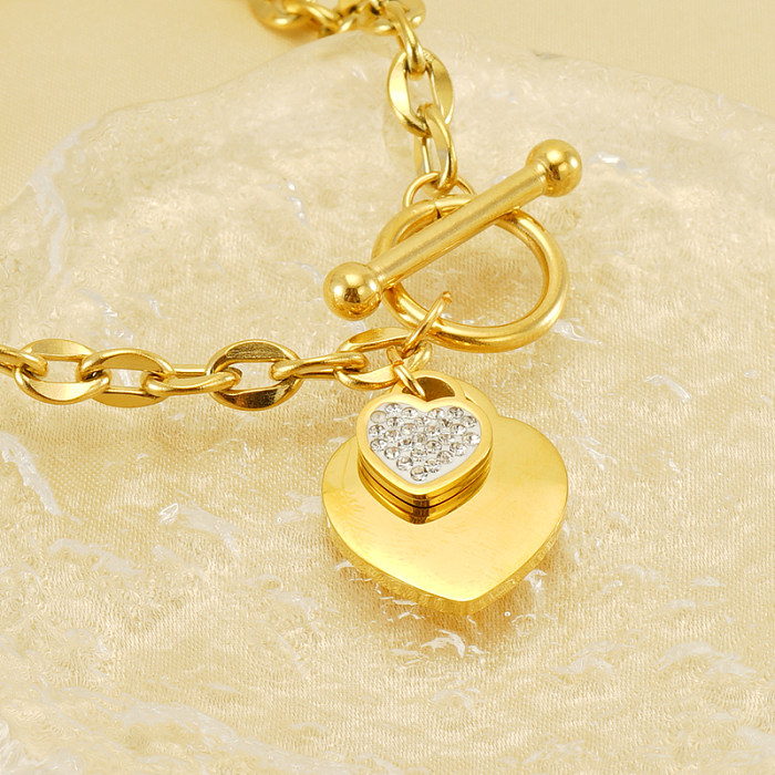 Süße herzförmige Edelstahl-Armbänder mit Toggle-Beschichtung und künstlichem Diamant, 18 Karat vergoldet