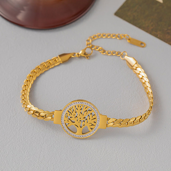 Bracelets de placage en acier titane de trèfle à quatre feuilles de style classique de style simple
