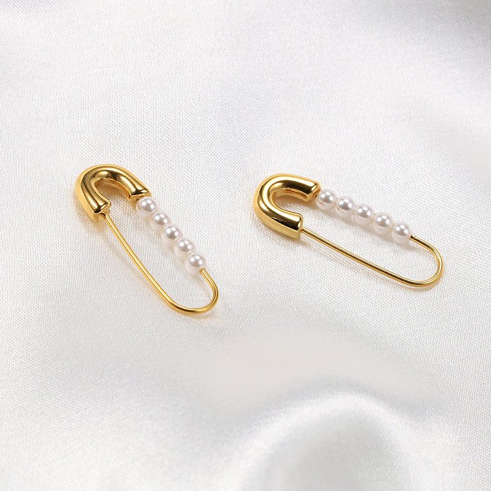 1 par de pendientes de perlas artificiales con incrustaciones de acero inoxidable con clip de papel elegante