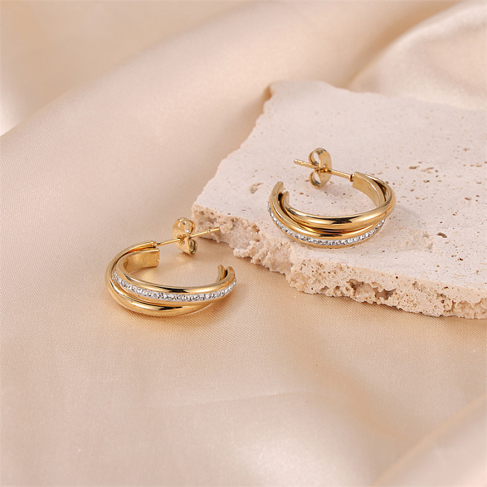 1 par de pendientes chapados en oro con diamantes de imitación de acero inoxidable con incrustaciones geométricas de viaje de estilo Simple para mujer