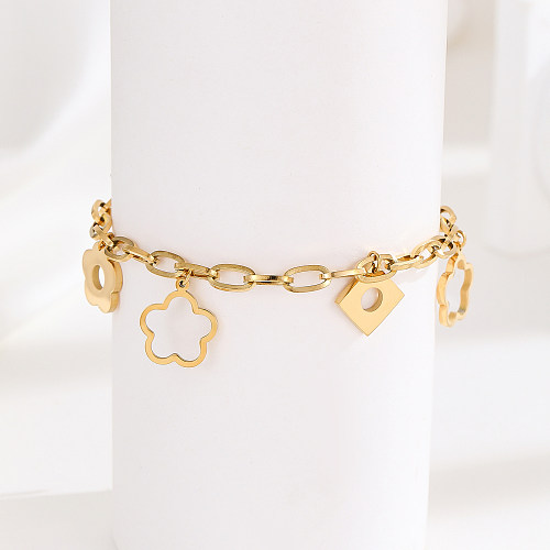 Gros doux style simple fleur placage en acier inoxydable évider bracelets plaqués or 18 carats