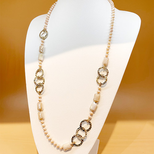 Glamouröse, moderne Halskette mit rundem, rechteckigem Edelstahl-Kristall und vergoldeter Metallbeschichtung