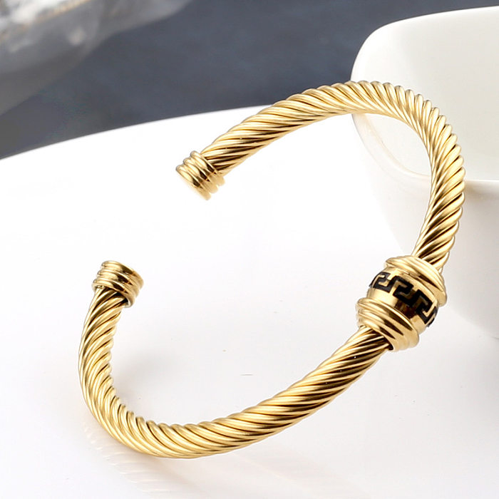 Hip-Hop-Spiralstreifen-Edelstahl-Polierbeschichtung mit 18-karätigem Gold überzogene Manschettenarmbänder