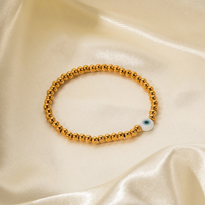 Schlichte Teufelsauge-Armbänder aus Edelstahl mit Perlenbeschichtung und 18-Karat-Vergoldung