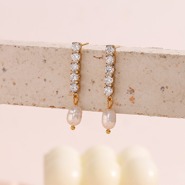 Elegante quadratische Ohrringe aus Edelstahl mit Inlay aus künstlichen Perlen und Zirkonen aus Edelstahl